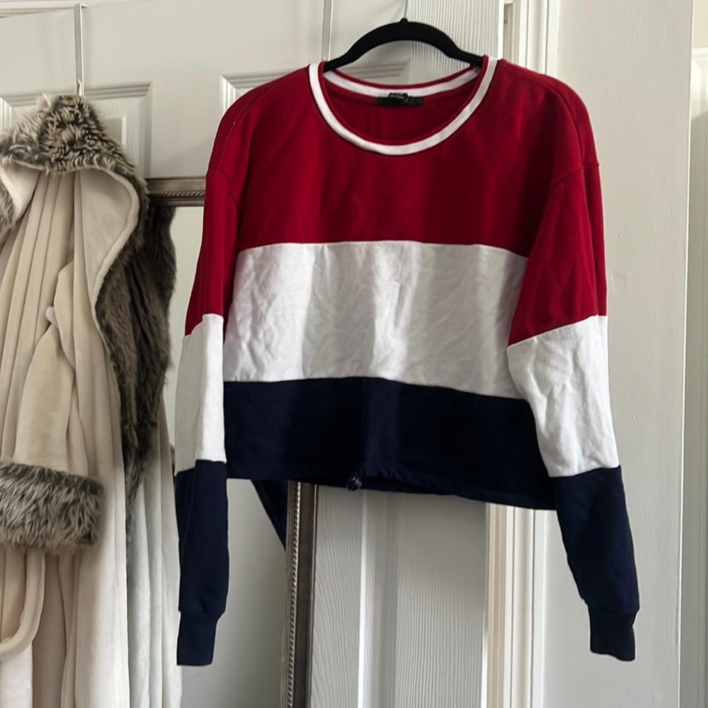 red white and blue cropped pull over
